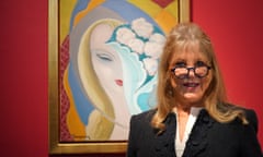 Pattie Boyd stands in front of a painting