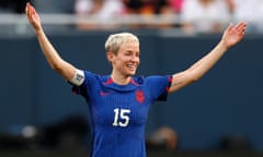 Megan Rapinoe celebrates USA's second goal against South Africa, scored by defender Emily Sonnett.