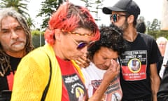 David Dungays cousin Lizzie Jarrett (left), mother Leetona Dungay and nephew Paul Silva Lidcombe are seen outside the Lidcombe Coroner’s Court in Sydney, Friday, November 22, 2019. A NSW coroner has found prison officials who restrained an Aboriginal man shortly before he died in custody were not motivated by malicious intent. (AAP Image/Peter Rae) NO ARCHIVING