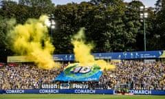 Union Saint-Gilloise fans display their colours before the game against Royal Antwerp on Sunday