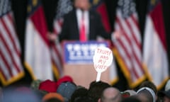 Donald Trump<br>ADVANCE FOR USE THURSDAY, OCT. 20, 2016 AND THEREAFTER-FILE - In this Monday, July 25, 2016 file photo, a supporter of Republican presidential candidate Donald Trump holds a sign during a campaign rally in Winston-Salem, N.C. A Kaiser Family Foundation-CNN poll released in September 2016 compared white college graduates and the white, black and Hispanic working class. Working-class whites were least likely to say that they're satisfied with their influence in the political process, that the federal government represents their views, and that they believe their children will achieve a better standard of living than themselves. (AP Photo/Evan Vucci)