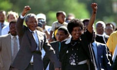 Nelson Mandela is accompanied by his then wife, Winnie, moments after his release from prison  in February 1990. 