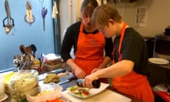 Henry working in the kitchen of the Outside The Box cafe.