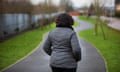 A woman on a path in a park