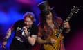 Axl Rose and Slash from Guns N' Roses performing on the Pyramid stage.