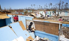 Haitians That Remain in Grand Abaco Island Struggle to Survive<br>GREAT ABACO, BAHAMAS - SEPTEMBER 9: Kristina Orlince sit in a destroyed home in the community of Farm Road. September 9, 2019 in Great Abaco, Bahamas. The few Haitians that decided to stay in hurricane devastated Great Abaco island struggle to survive with the little help they receive from foreign aid agencies. Hurricane Dorian hit the island chain as a category 5 storm battering them for two days before moving north. (Photo by Jose Jimenez/Getty Images)