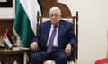 Mahmoud Abbas sat with a grim-set face in a meeting chair in front of the Palestinian flag