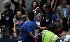 Activists protest on Capitol Hill against the nomination of Brett Kavanaugh to the supreme court.