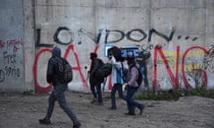 People leaving the Calais refugee camp on 24 October 2016