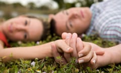 Couple holding hands