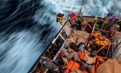BESTPIX Search And Rescue On The Mediterranean With Proactiva Open Arms<br>AT SEA - FEBRUARY 18:  Refugees and migrants sleep on the deck of the Spanish NGO Proactiva Open Arms rescue vessel Golfo Azzurro after being rescued off  Libyan coast north of Sabratha, Libya on February 18, 2017 at Sea. 466 migrants have been rescued in high seas since yesterday evening by the Italian Coast Guard and the Spanish NGO Proactiva Open Arms rescue vessel Golfo Azzurro as they continue to search for more boats. Proactiva Open Arms are a Spanish charity based out of Malta who provide search and rescue assistance to refugees and migrants in distress at sea. They patrol the SAR and Rescue Zone off the coast of Libya running rescue missions for the hundreds of migrants who continue to make the perilous journey across the Mediterranean in the hope of reaching the European mainland.  (Photo by David Ramos/Getty Images) *** BESTPIX ***