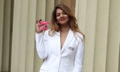 MIA accepts an MBE outside Buckingham Palace, London, 14 January 2020.