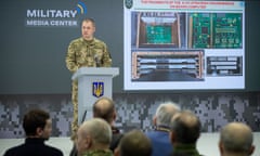 Members of the Ukraine media at a press briefing in Kyiv about Russian missiles on Thursday, almost a year into the invasion