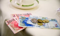 Payment sitting on a restaurant table.