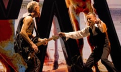 Depeche Mode’s Martin Gore and Dave Gahan onstage at the O2, smiling at each other