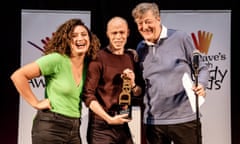 Stephen Fry, 1981 winner, and Rose Matafeo, 2018 winner, presenting the Dave's Edinburgh Comedy award to Jordan Brookes in 2019.