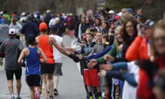 Spectators greet runners as they start the Boston Marathon in Hopkinton, Massachusetts, April 20, 2015. A field of 30,000 runners is set to line up for the 119th running of the world's oldest annual marathon. REUTERS/Dominick Reuter