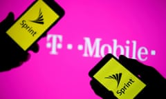 FILE PHOTO: A smartphones with Sprint logo are seen in front of a screen projection of T-mobile logo, in this picture illustration taken April 30, 2018. REUTERS/Dado Ruvic/Illustration/File Photo