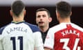 Michael Oliver speaks with Erik Lamela and Granit Xhaka.