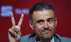 Luis Enrique, the returning Spain manager, gives a victory sign during Wednesday’s press conference.