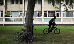 boys on bikes on council estate