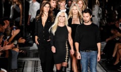 Anthony Vaccarello with Donatella Versace, on the catwalk after the Versus Versace spring/summer 2015 show.