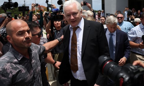 WikiLeaks founder Julian Assange leaves the courtroom.