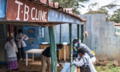 Patients wait outside a TB Clinic in Kibera