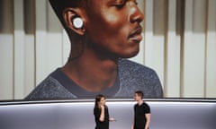 Google Pixel Buds and the Google Pixel 2 smartphone at a product launch in October.