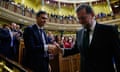 The new Spanish prime minister, Pedro Sánchez, left, shakes hands with his predecessor, Mariano Rajoy, after Sánchez won the no-confidence motion.