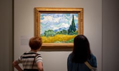Media Preview Of "Van Gogh's Cypresses" Exhibition In New York<br>NEW YORK, NY - MAY 15: People look at a painting during the media preview of "Van Gogh's Cypresses" Exhibition at the Metropolitan Museum of Art on May 15, 2023 in New York City. (Photo by Wang Fan/China News Service/VCG via Getty Images)