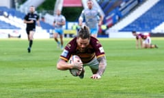 Chris McQueen scores Huddersfield's fourth try.