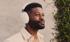 Sonos Ace headphones worn by man.