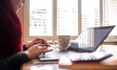 Woman sitting at desk with laptop