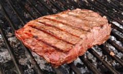 Steak on a barbecue.
