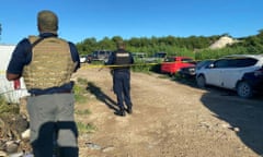 Police officers at the scene of the triple murder in Dock Yard, Providenciales (Photo: Royal TCI Police Force)