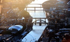 North East of England stock<br>Aerial view of Newcastle city centre showing the Tyne Bridge, the Gateshead Millennium Bridge (also know as the 'Blinking Eye Bridge'), The Baltic Arts Centre and the Sage Gateshead music centre.
 General View GV from top up above compression arch suspended-deck pedestrian cyclist tilt musical education affordance conferences contemporary Art centre The Toon England MANGSM UIGCLAREH