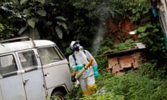 A State Endemics Control health agent fumigates insecticide in an area to kill mosquitoes during a campaign against yellow fever in Sao Paulo