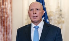 Defence minister, Peter Dutton, in front of an Australian flag