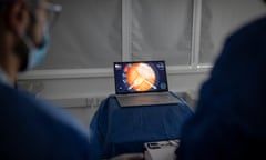 Dr Mary Gobl, a first year specialising in surgery, attempts a simulated appendectomy at the Surgical Innovation Centre at St Mary's hospital in Paddington, west London