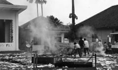 Students in Jakarta, Indonesia, burning the headquarters of the Communist Youth Organisation in 1965