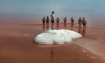 A group of retirees from the city of Tabriz wades in Lake Urmia’s salty water. Tabriz, Iran. 2016