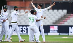 Shaheen Afridi celebrates dismissing Rory Burns with Pakistan teammates including Naseem Shah during the first Test against England at Old Trafford