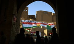 Giant Kurdish flags adorn the hill of Erbil citadel, in the capital of the autonomous Kurdish region of northern Iraq.