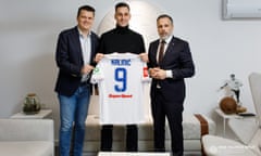 Nikola Kalinic poses with the No 9 shirt after rejoining Hajduk Split on Wednesday.