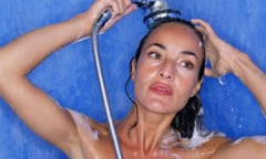10189912.jpg close-up of woman in shower, washing her hair shampoo