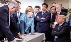 President Donald Trump with Angela Merkel and other G7 leaders during the 2018 summit in Canada. 