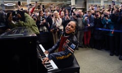 Alicia Keys performs on a ‘street piano’ at St Pancras station in London on 11 December.