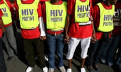 Demonstrators in South Africa hold hands during a protest in support of the Treatment Action Campaign global call to action on tuberculosis and HIV/Aids.