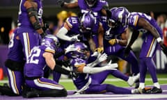 Minnesota Vikings safety Camryn Bynum celebrates with teammates after intercepting Brock Purdy